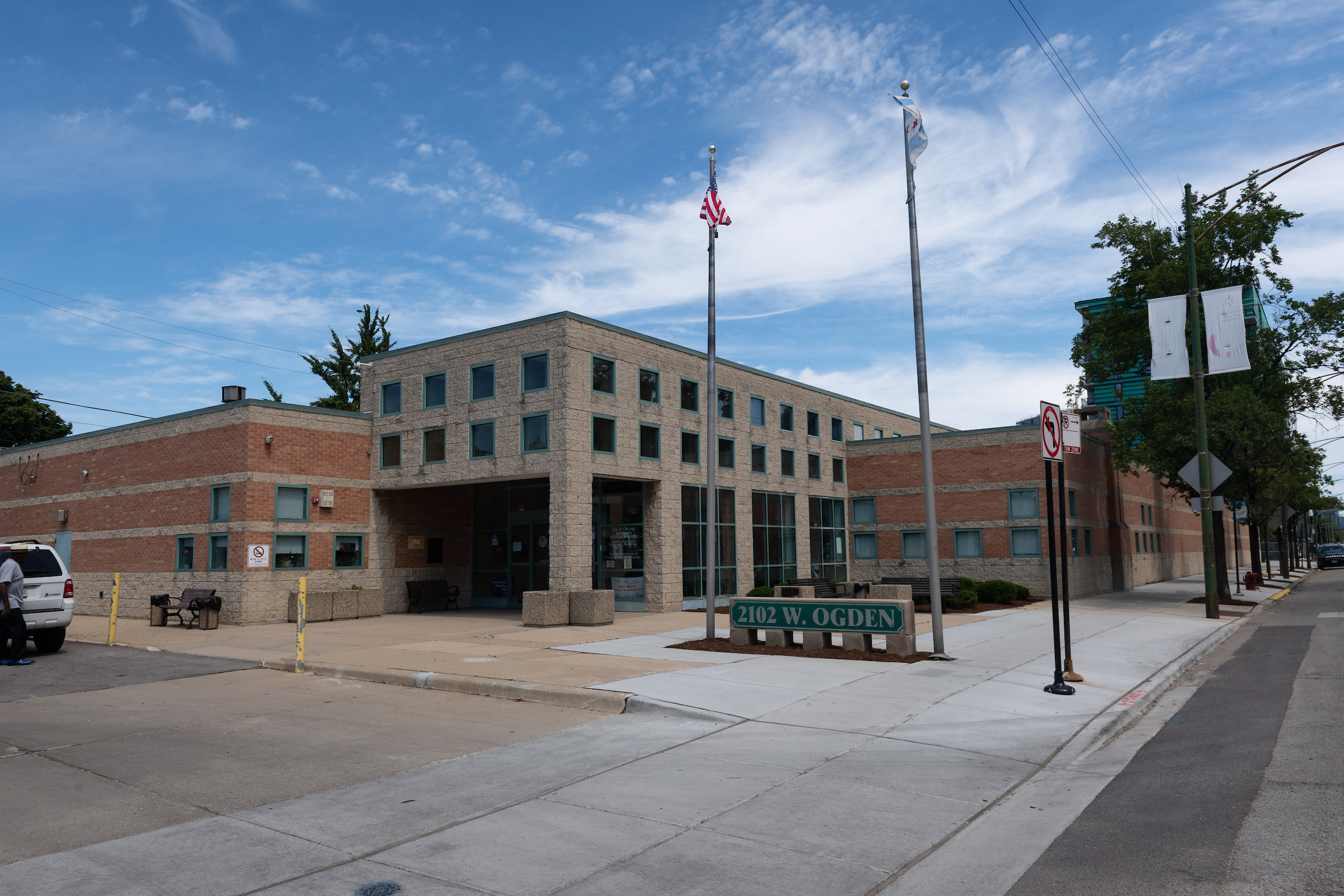 Photo taken of the MOPD Field Office, taken from the parking lot, with a sign that reads, 